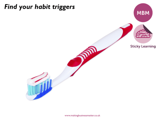 Find your habit trigger above red and white toothbrush with toothpaste next to MBM logo