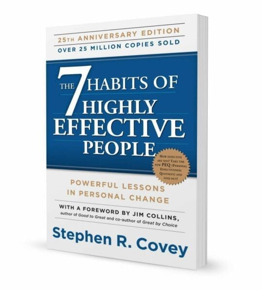 Blue and white book cover of The 7 Habits of Highly Effective People book cover by Stephen Covey