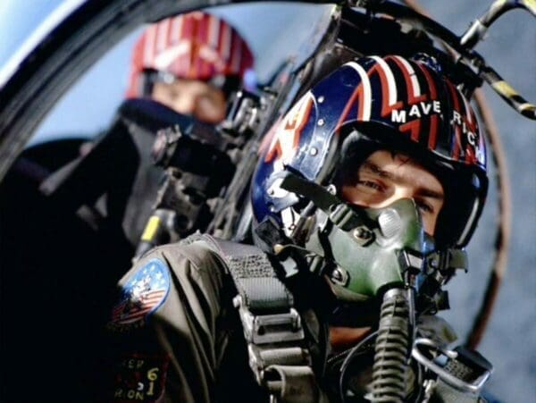 Tom Cruise as maverick pilot with co pilot behind him from Top Gun film
