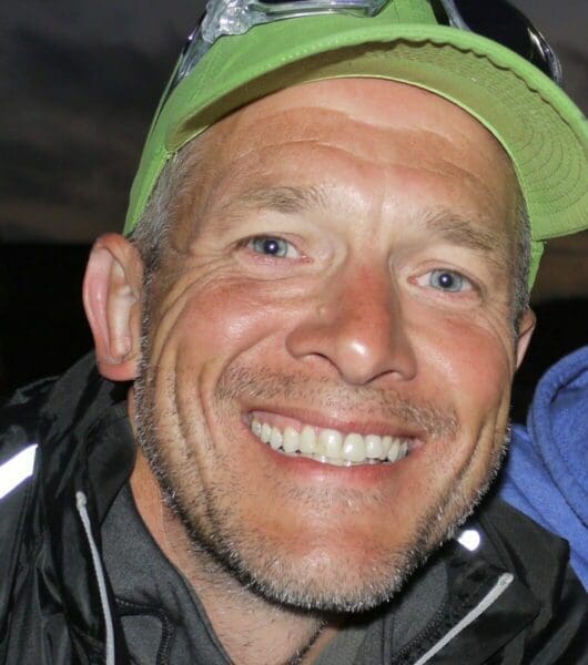Simon Spence of Westbridge Foods with green cap smiling
