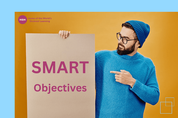 Man pointing to a sign with Smart Objectives