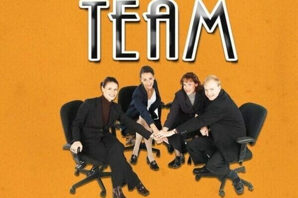 Team above four people in suits on office chairs hand huddling