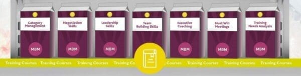 Pink carton courses from MBM on a shelf