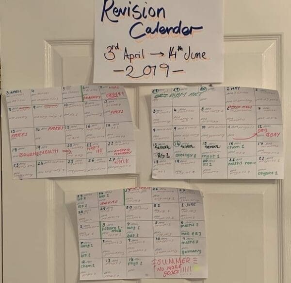 Hand-drawn revision calendar for three month taped to a door for school success