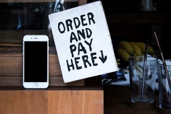 Order and pay here sign with iPhone