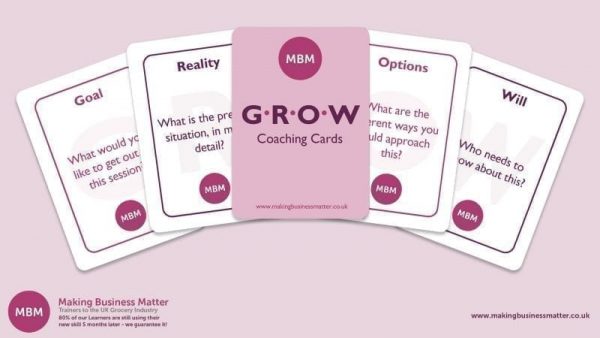 MBM banner with five GROW coaching cards fanned out across it