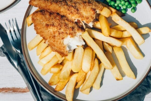 Fish, chips and peas on a plate