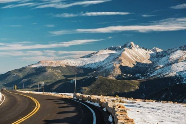 Winding road through a snowy mountain region 