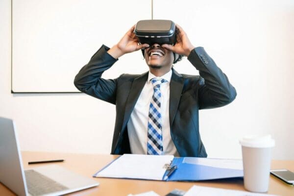 Businessman using VR glasses to train