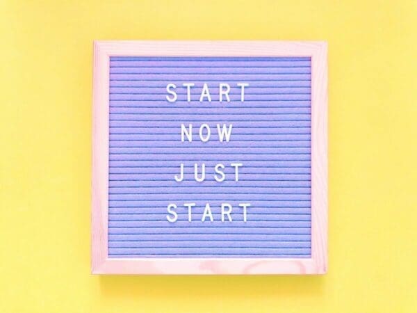 Start Now Just Start framed quote on yellow background