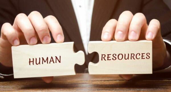 Two jigsaw piece that say Human Resources