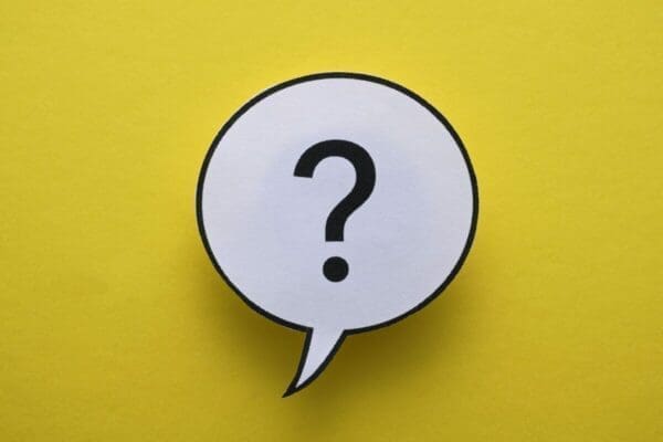 Round speech or thought bubble with question mark and yellow background