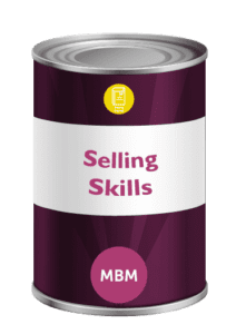 Purple tin with Selling Skills on the tin