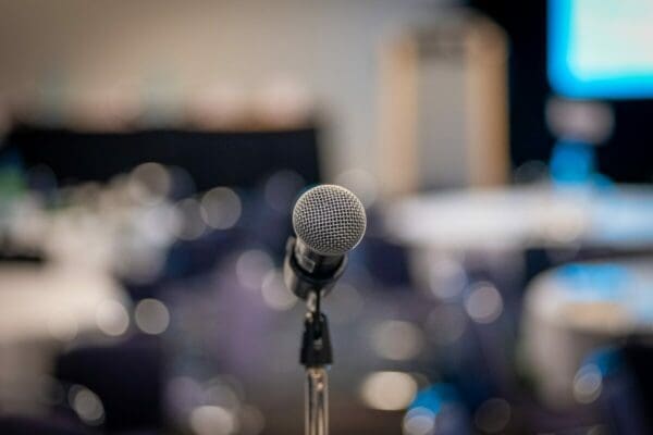 In focus microphone with background blurred for public speaking