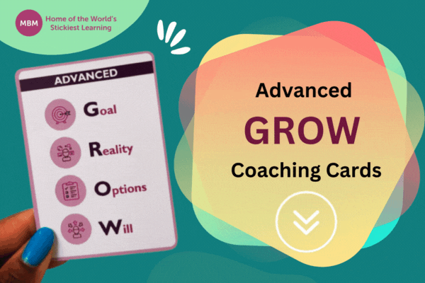 Hand holding an Advanecd Grow Coaching Card from MBM product banner
