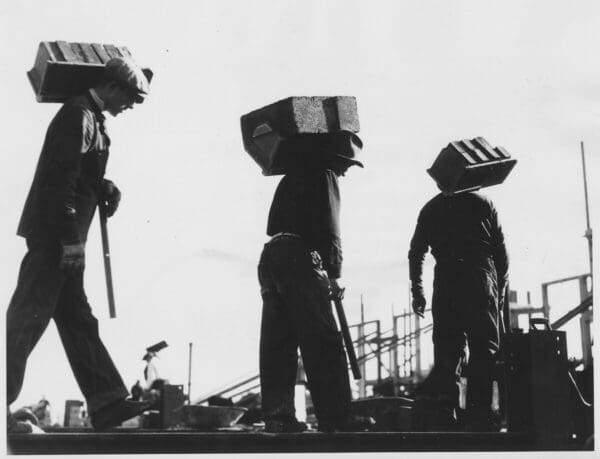 Black and white picture of hod carriers