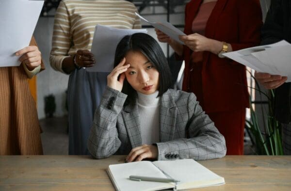 Unmotivated Asian Businesswoman at Work