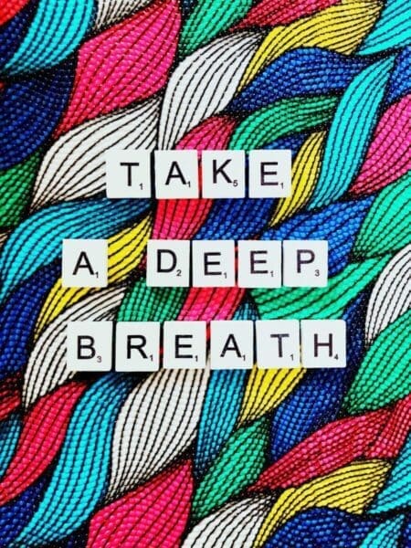 Take a deep breath text on colorful background