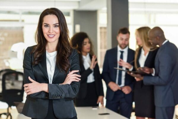 Women Entrepreneur standing and smiling