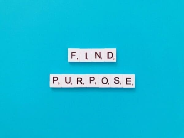 Find purpose quote on blue surface