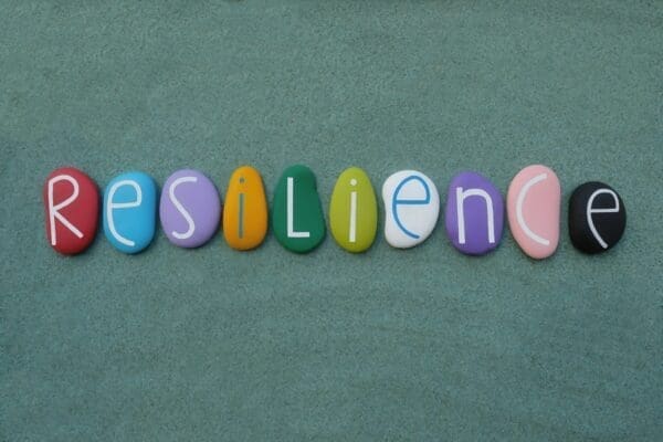 Resilience spelled with colourful rocks