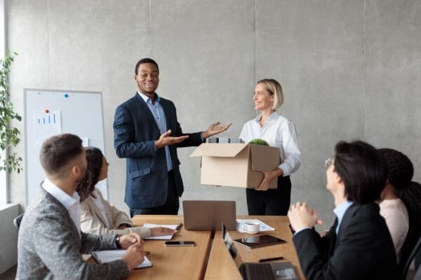 Businessman Introducing New Employee during onboarding rpocess