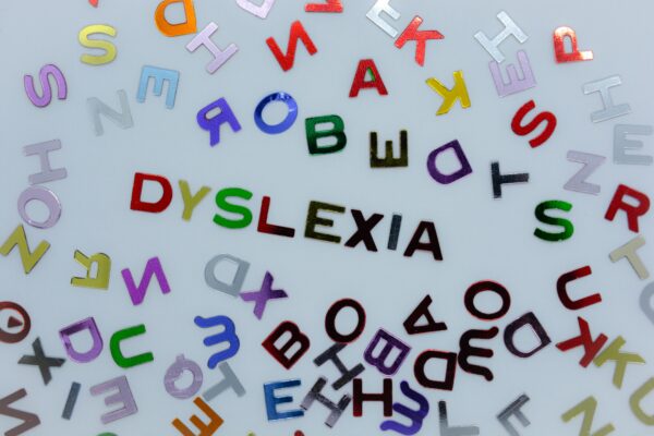 Dyslexia in a sea of random colorful letters and symbols