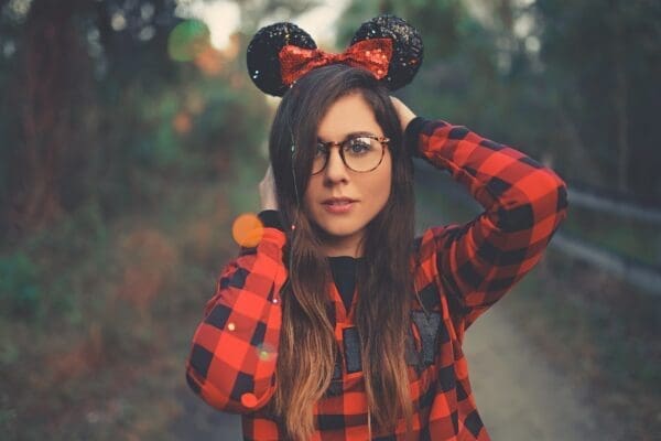 Young women with Minnie Mouse ears on 