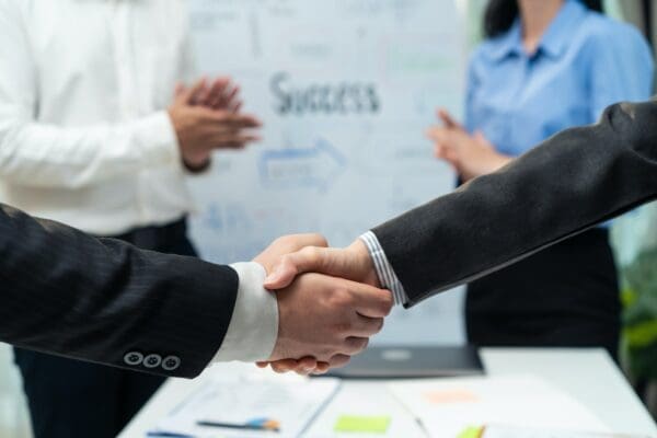 Close up of handshake between businesspeople after a negotiation