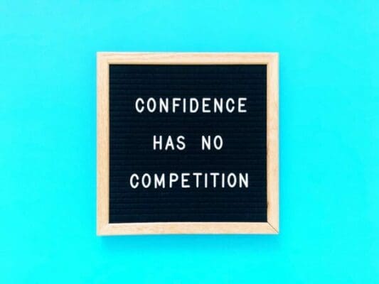 Confidence has no competition quote on felt board