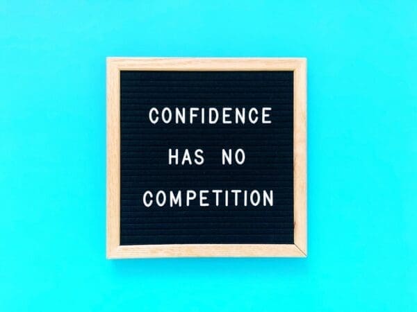 Confidence has no competition quote with blue background