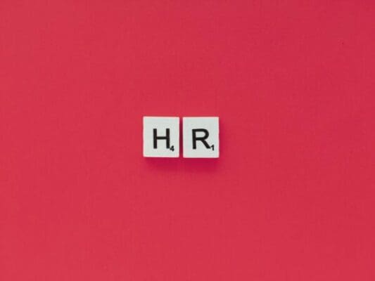 HR letters on a pink background for Human Resource