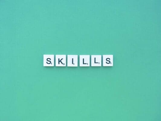 Skills scrabble letters word on a green background