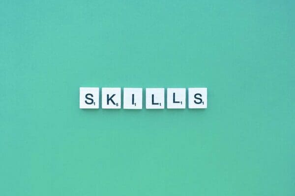Skills scrabble letters word on a green background