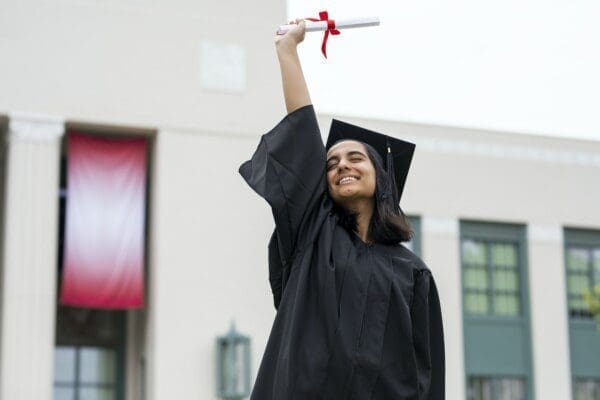 Girl graduate celebrating academic achievement