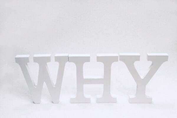Why spelled with white letters against white background