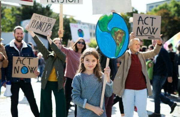 Protesters with placards and posters on global strike for climate change