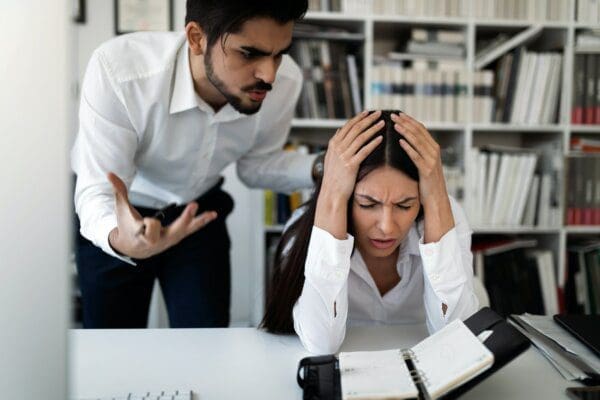 Picture of angry boss criticising his worker