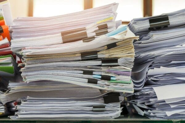 Close up of business documents stack on desk