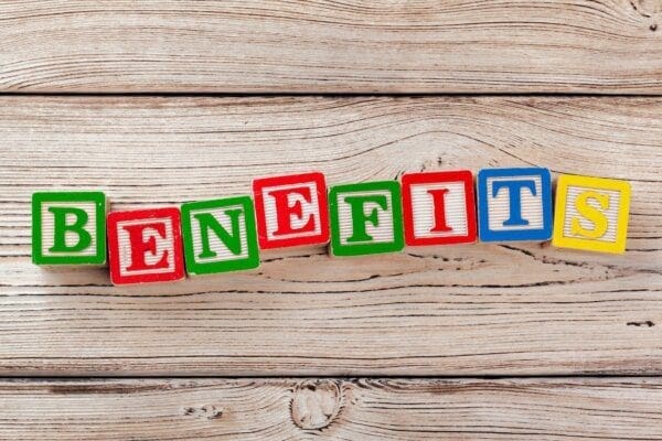 Benefits spelled with coloured wooden alphabet blocks