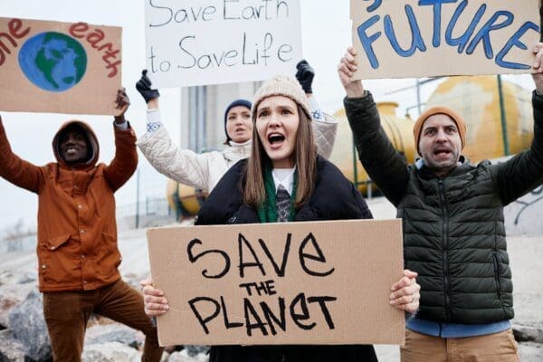 Young people with environmental protest signs 