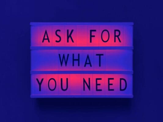 Ask for what you need quote on a lightbox with dark blue background for a persuasion technique