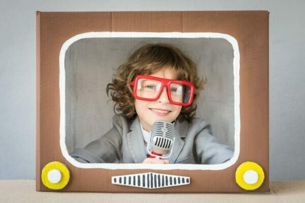 ISFJ child actor on a cardboard TV
