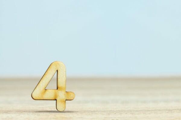 golden number four with light blue background