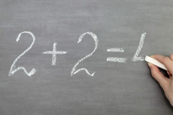 Chalkboard drawing of a math equation example