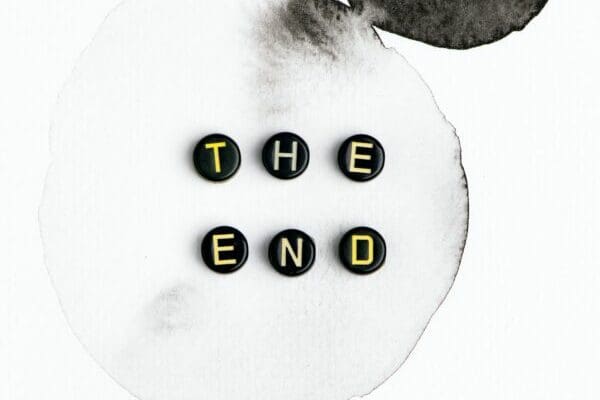 THE END word spelled with alphabet letter beads