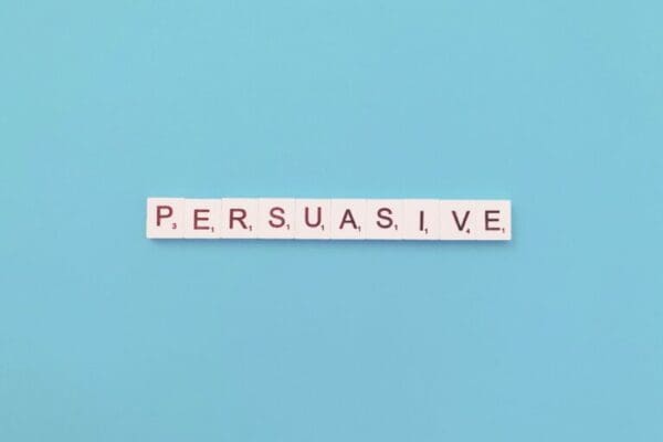 persuasive spelled on blue background