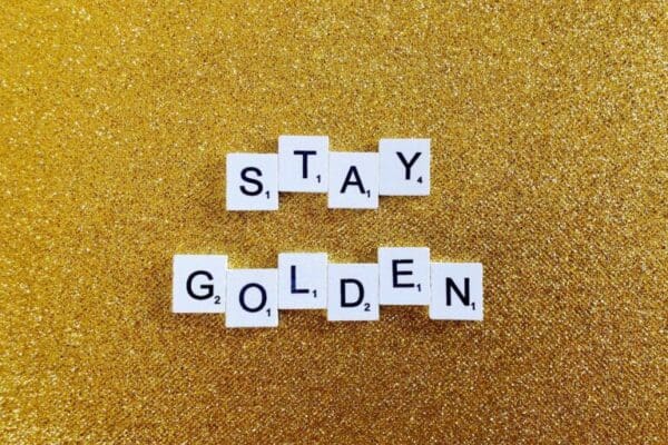 Stay golden on sparkly gold surface