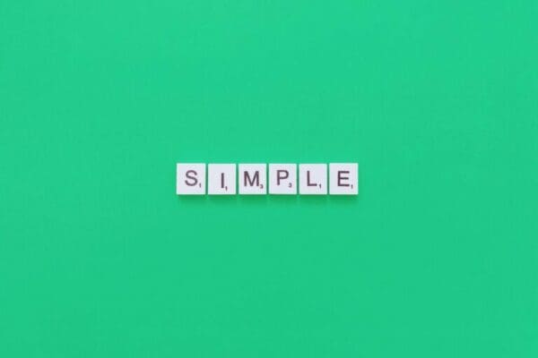 simple spelled on green background
