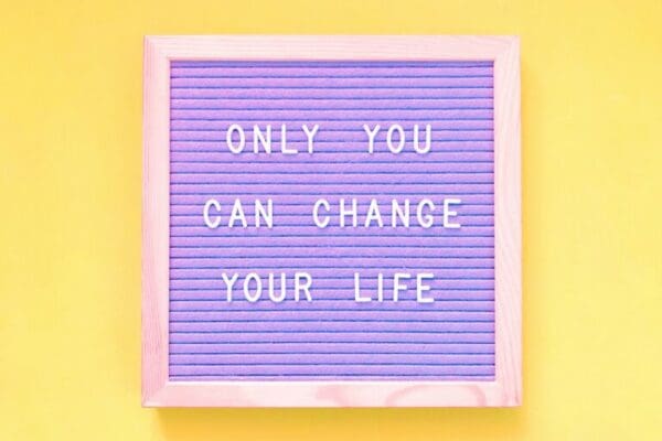 Only you can change your life quote with yellow background